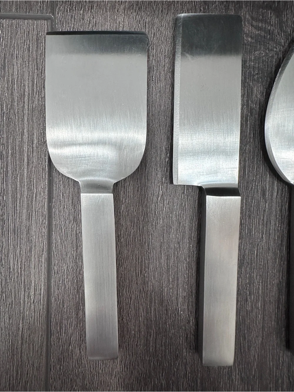 Calvin Klein stainless steel cheese serving set by Calvin Klein Home collection.